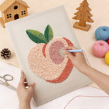 Punching the Blush Peach design with the punch needle