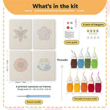 What is in the Bold Flower Heads set, 8 × 12 in (20 × 30 cm) each: 4 printed canvases, punch needle, threader, threads, color guide and 4 sets of hangers