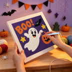 Punching the Boo Ghost design with the punch needle