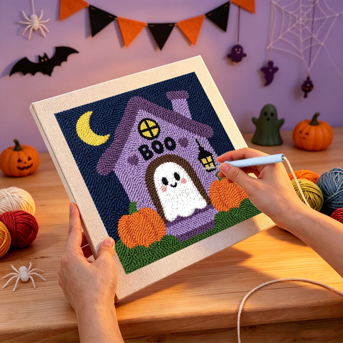 Punching the Boo House Ghost design with the punch needle