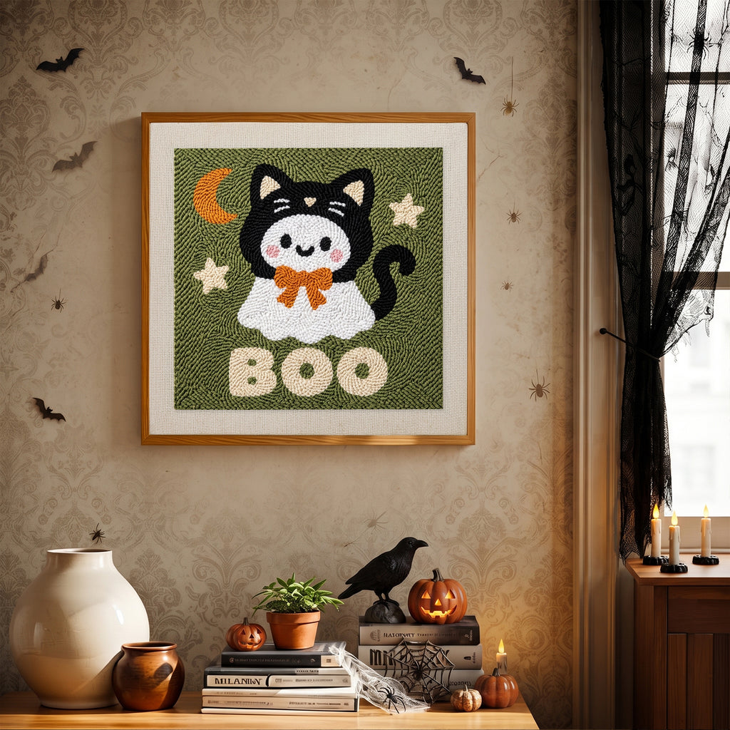 Finished Boo Kitty Ghost punch needle canvas on a wall