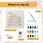 What is in the Boo to You Apple kit: printed canvas, punch needle, threader, threads, color guide and hangers
