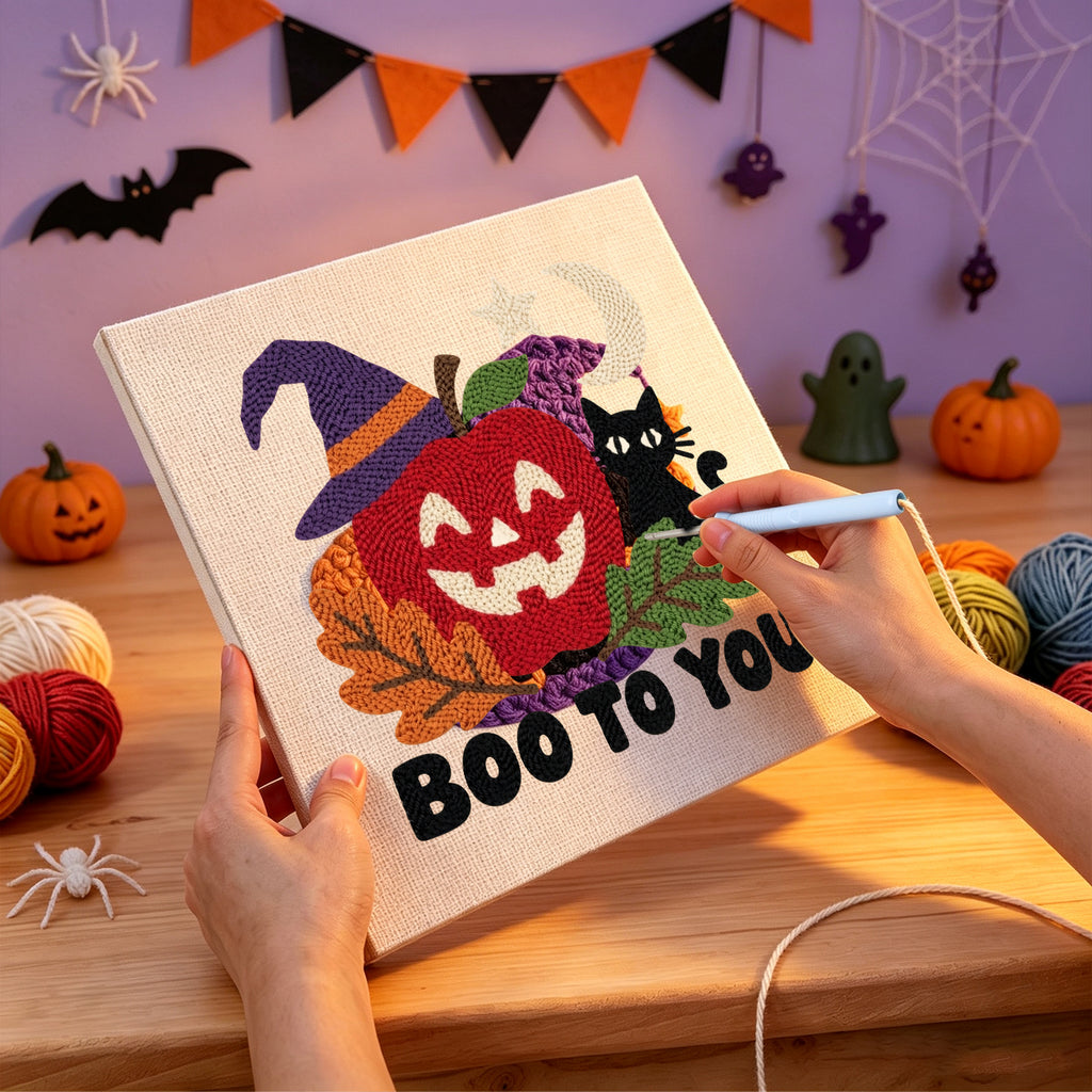 Punching the Boo to You Apple design with the punch needle