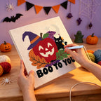 Punching the Boo to You Apple design with the punch needle