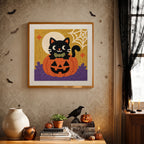 Finished Bow Tie Cat on a Pumpkin punch needle canvas on a wall