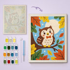 Bow Tie Owl canvas before and after punching, with the threads and tools