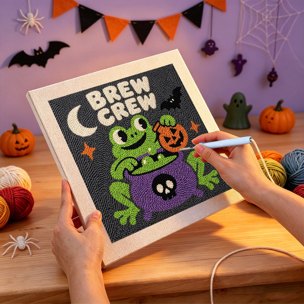 Punching the Brew Crew Frog design with the punch needle