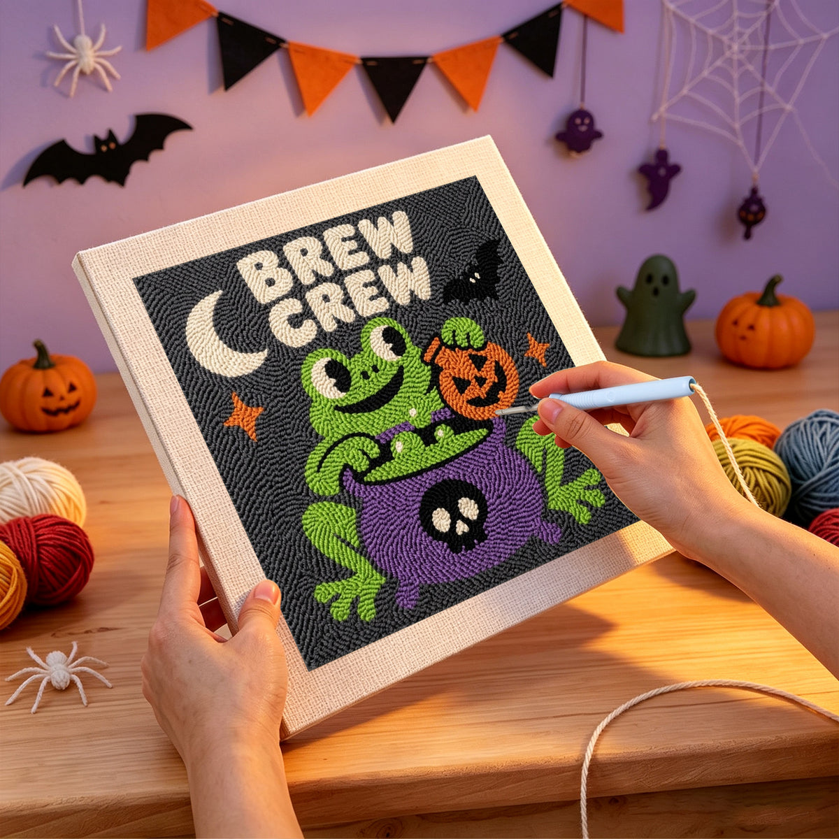Punching the Brew Crew Frog design with the punch needle