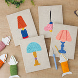 The four finished Bright Retro Lamps mini canvases laid out on a table