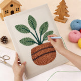 Punching the Broad Leaf Pot design with the punch needle