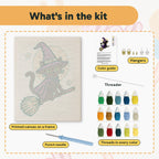 What is in the Broomstick Cat in Purple kit: printed canvas, punch needle, threader, threads, color guide and hangers