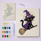 Broomstick Cat in Purple canvas before and after punching, with the threads and tools