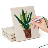 Hand punching one of the Brown Pot Jungle mini canvases