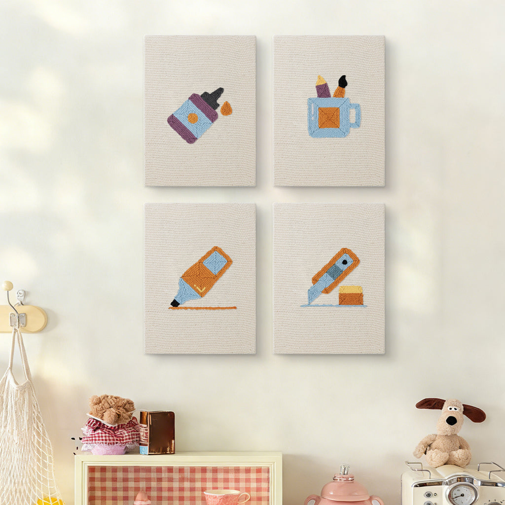 The four Brush Mug Crafts mini canvases on a wall above a shelf