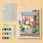 Bucket Bouquet canvas before and after punching, with the threads and tools