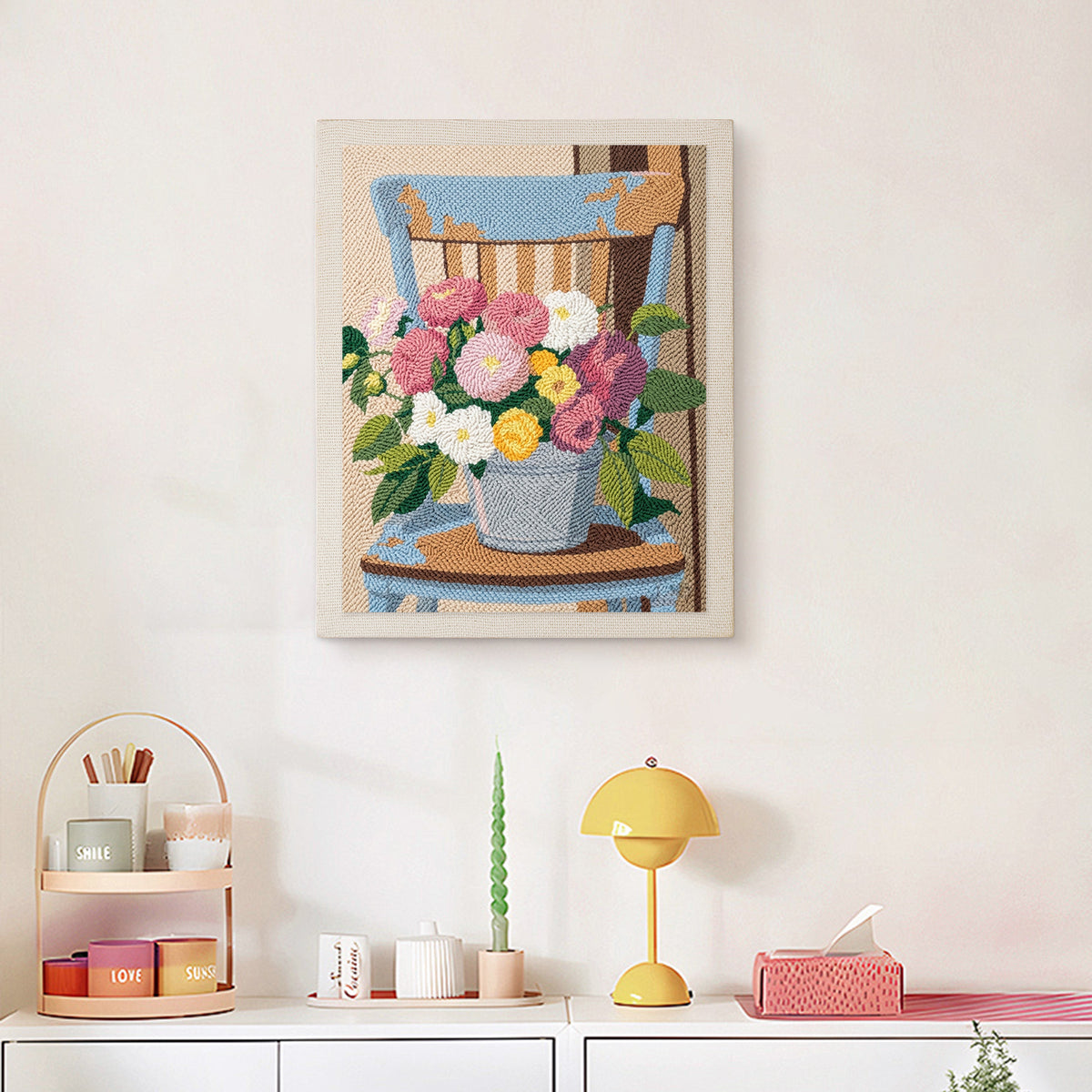 Finished Bucket Bouquet punch needle canvas on a wall