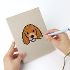 Punching a Bunny and Hippo mini canvas with the punch needle