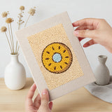 Hand holding a finished Burger and Donut mini canvas