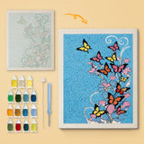 Butterfly Swirl canvas before and after punching, with the threads and tools