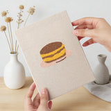 Hand holding a finished Cafe Sweet Treats mini canvas