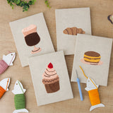 The four finished Cafe Sweet Treats mini canvases laid out on a table