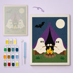 Camping Ghosts canvas before and after punching, with the threads and tools