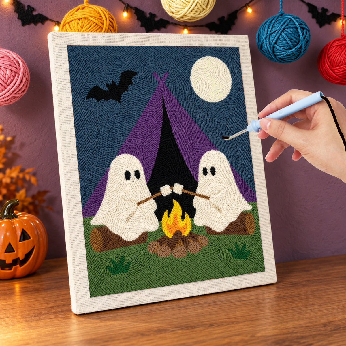 Punching the Camping Ghosts design with the punch needle