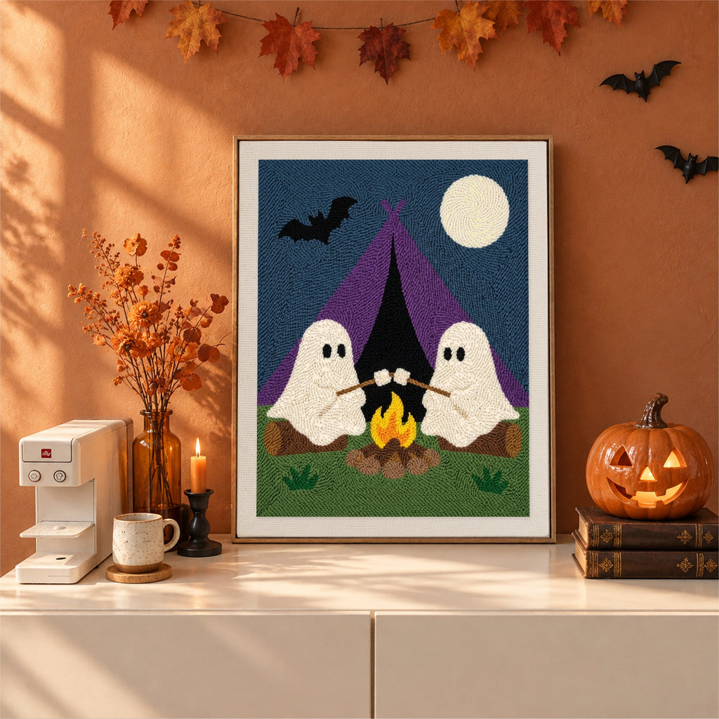 Finished Camping Ghosts punch needle canvas on a wall