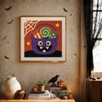 Finished Candy Cauldron punch needle canvas on a wall