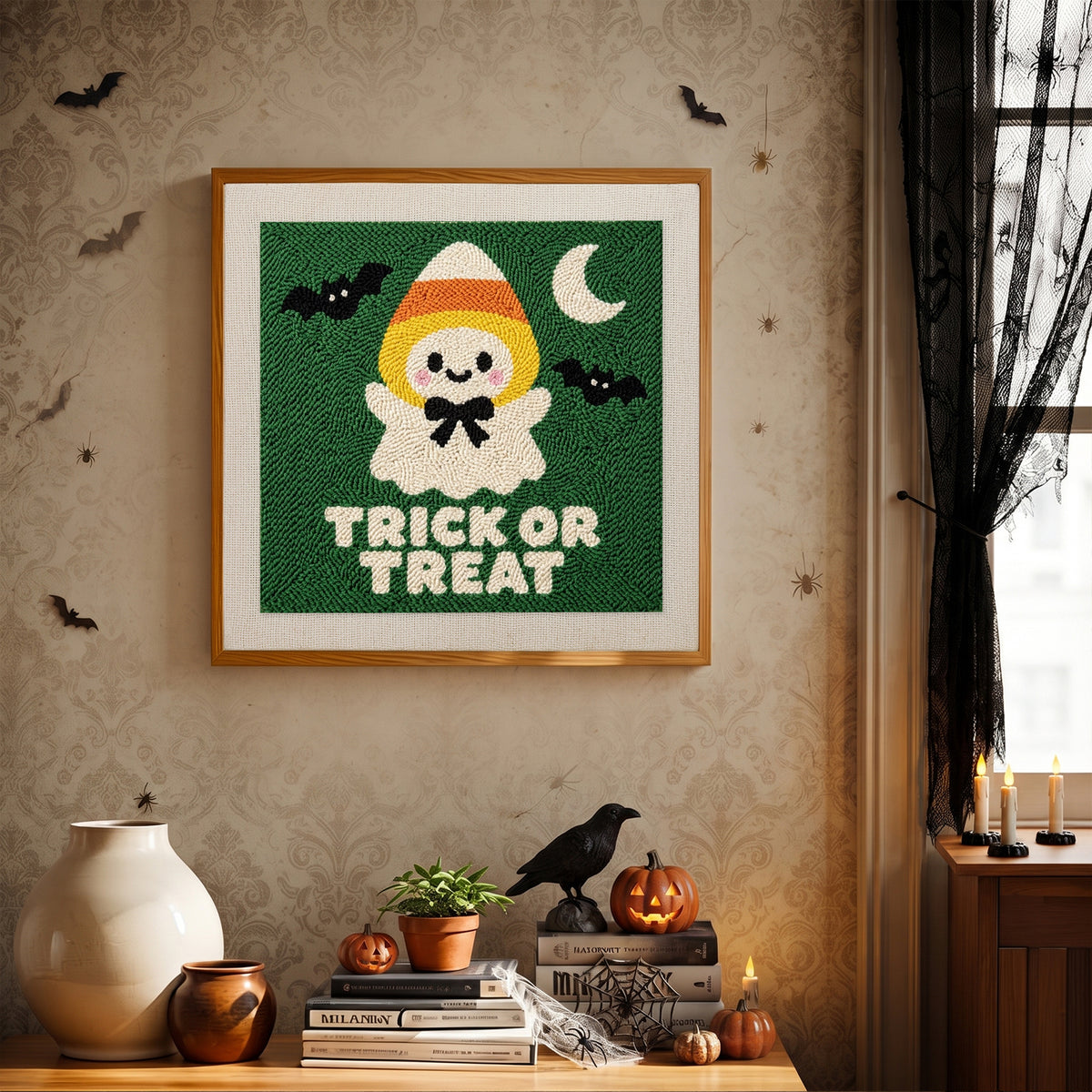 Finished Candy Corn Ghost punch needle canvas on a wall