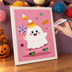 Punching the Candy Corn Hat Ghost design with the punch needle