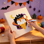 Punching the Caramel Cone Bat design with the punch needle