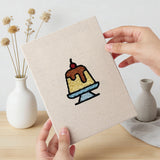 Hand holding a finished Caramel Pudding Cafe mini canvas