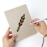 Punching a Caramel Pudding Cafe mini canvas with the punch needle