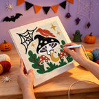 Punching the Cardinal on a Toadstool design with the punch needle