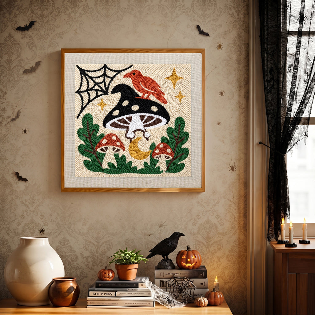 Finished Cardinal on a Toadstool punch needle canvas on a wall