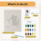 What is in the Cat and Ghost Candy Bag kit: printed canvas, punch needle, threader, threads, color guide and hangers