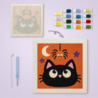 Cat and Spider canvas before and after punching, with the threads and tools