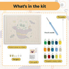 What is in the Cat Ghost in a Witch Hat kit: printed canvas, punch needle, threader, threads, color guide and hangers