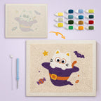Cat Ghost in a Witch Hat canvas before and after punching, with the threads and tools