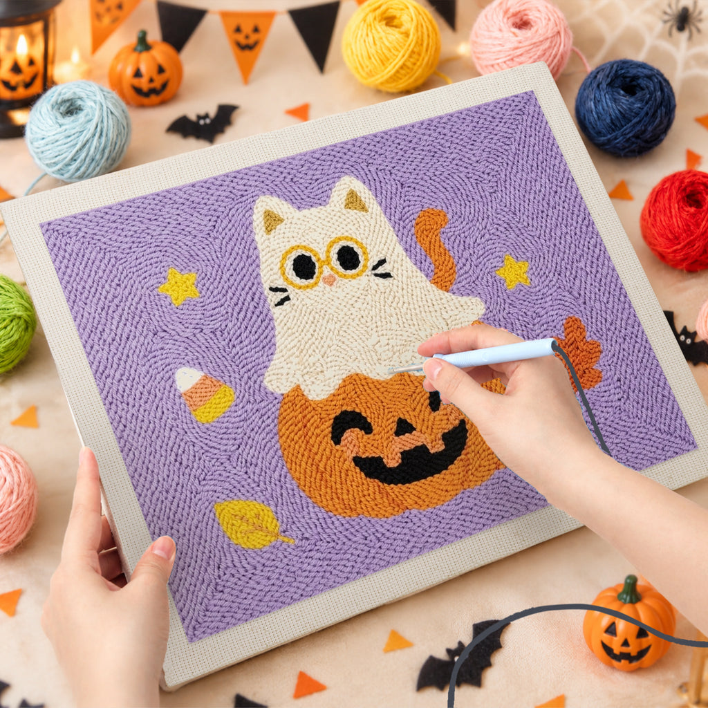 Punching the Cat Ghost on a Pumpkin design with the punch needle