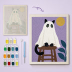 Cat Ghost on a Stool canvas before and after punching, with the threads and tools