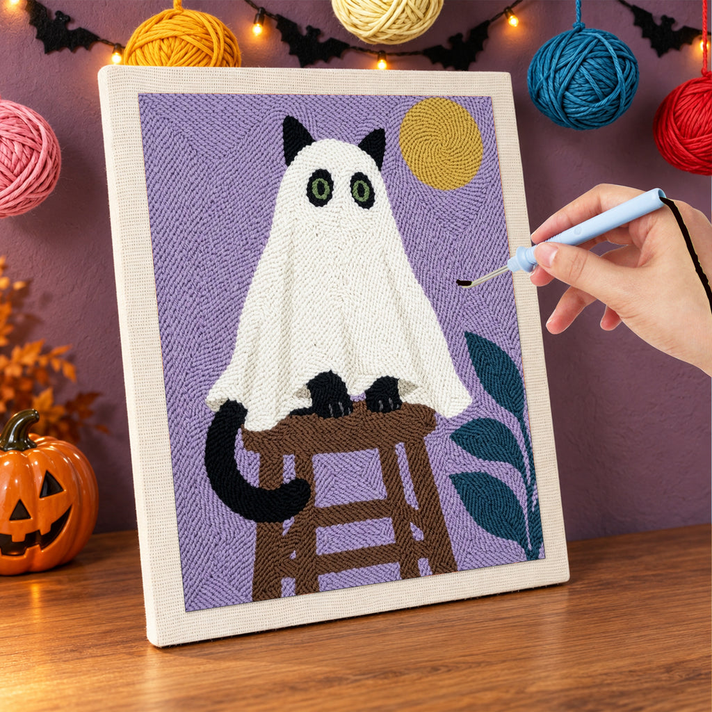 Punching the Cat Ghost on a Stool design with the punch needle