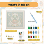 What is in the Cat in a Ghost Sheet kit: printed canvas, punch needle, threader, threads, color guide and hangers