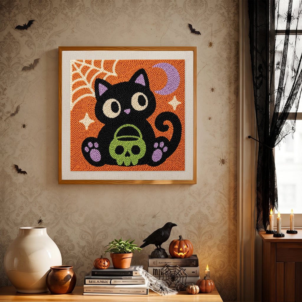 Finished Cat with Skull Pail punch needle canvas on a wall