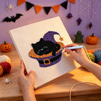 Punching the Catnap in a Hat design with the punch needle