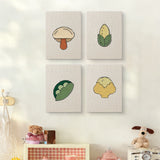The four Cauliflower Corner mini canvases on a wall above a shelf