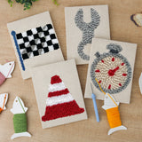 The four finished Checkered Flag Racing mini canvases laid out on a table