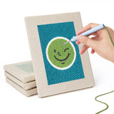 Hand punching one of the Cheeky Face Circles mini canvases