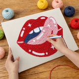 Punching the Cheeky Red Lips design with the punch needle